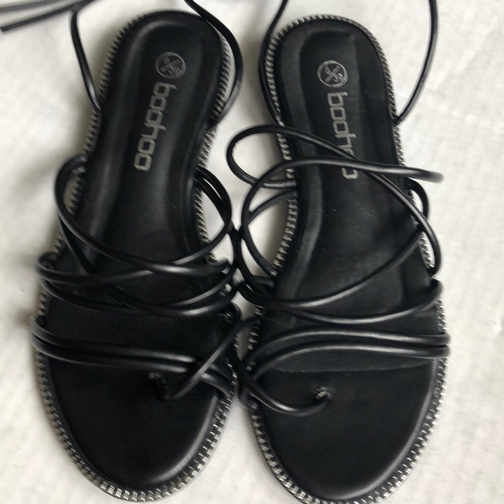 Black gladiator style tie up shoes in 8.5 NWOT